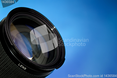 Image of Photography lens over blue