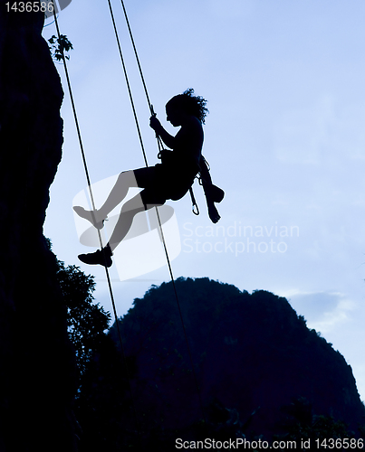 Image of Climbing woman silhouette