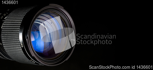 Image of Photography lens over black