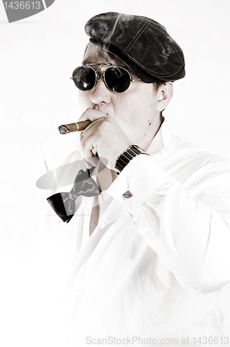 Image of Big boss smoking cigar