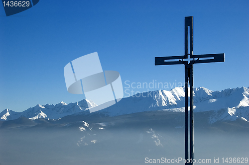 Image of Cross on the top of a mountain