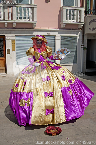 Image of VENICE, ITALY - APRIL 10, 2011, Woman in costume.