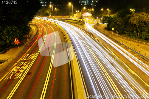 Image of traffic downtown at night