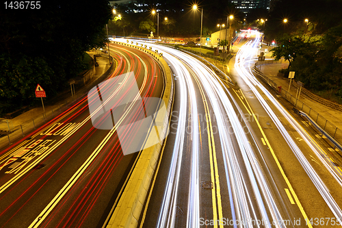 Image of car trails in city
