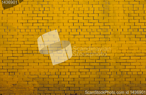 Image of Background with old yellow painted brick wall