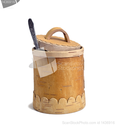 Image of barrel of the honey with spoon on white background