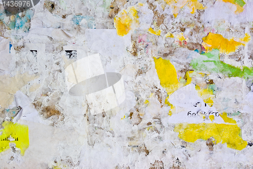 Image of remains of posters and advertisements