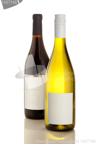 Image of White and Red wine on the white reflecticve table