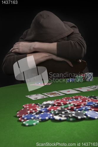 Image of Man playing poker