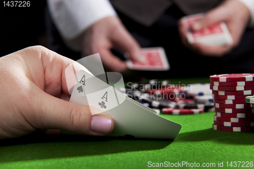 Image of Texas holdem ace pair