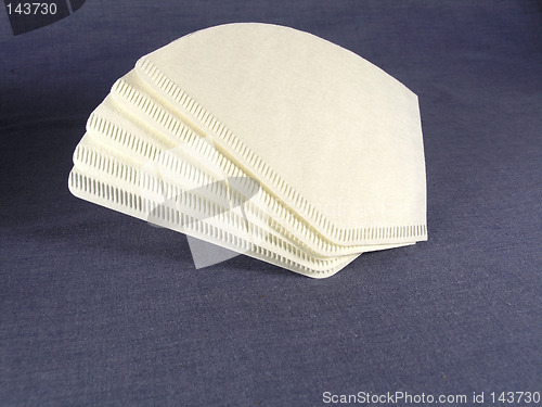 Image of coffee filter on blue background