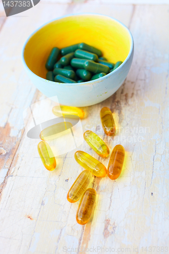 Image of fish oil vitamins  and herbal pills