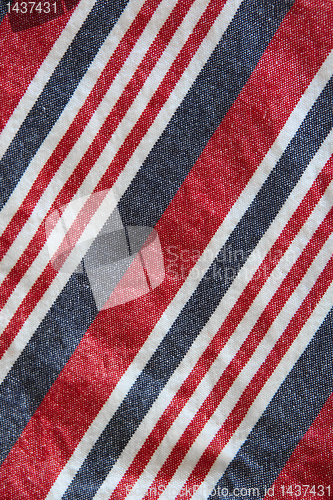 Image of cotton with red, blue and white stripes