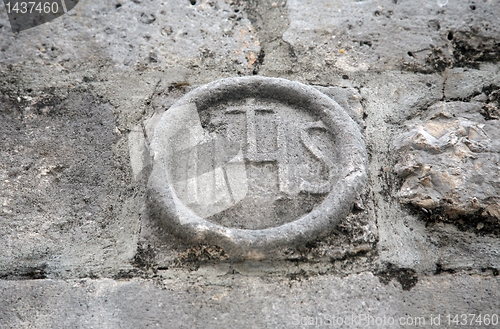 Image of IHS sign: Jesus Hominum Salvator