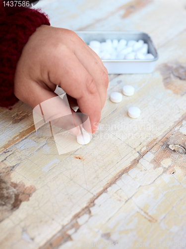 Image of child and drugs