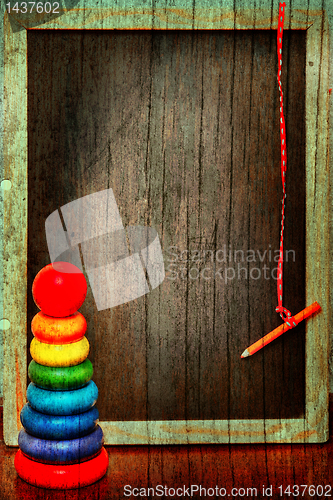 Image of grunge blackboard and pyramid