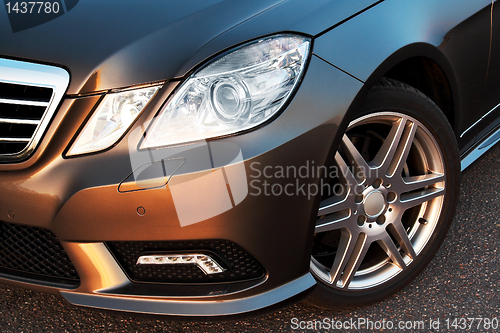 Image of Front wheel, bumper and light detail