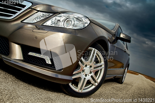 Image of Front wheel, bumper and light detail