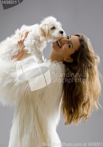 Image of sexy fit woman with pet