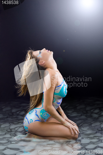 Image of bodypainting nude woman