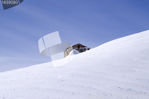 Image of The old brick house in middle of ski slope