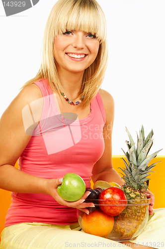 Image of Happy women with fruits