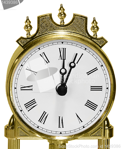 Image of golden watch close up