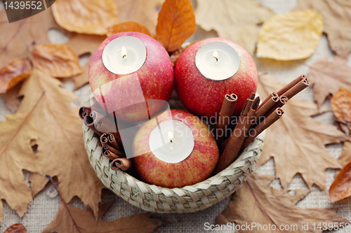 Image of apple as candlestick