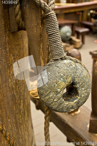 Image of Old rope and wooden block pulleys