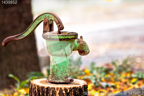 Image of Rusty olf water pump