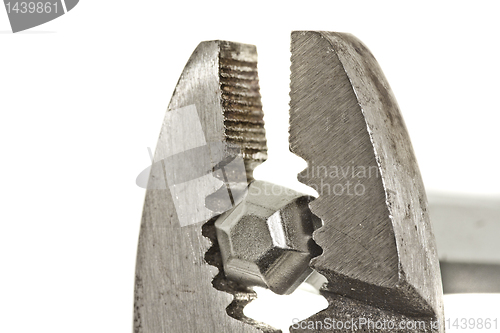 Image of Slip joint pliers griping on