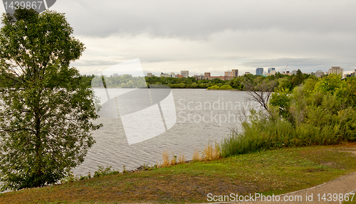 Image of Wascana lake with Downtown Regina in the background