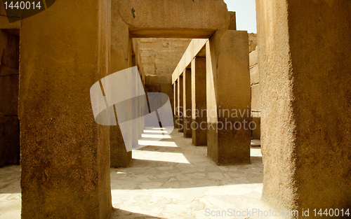 Image of Ancient stone pillars underneath Spinx