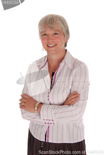 Image of Smiling Senior Businesswoman with Arms Folded