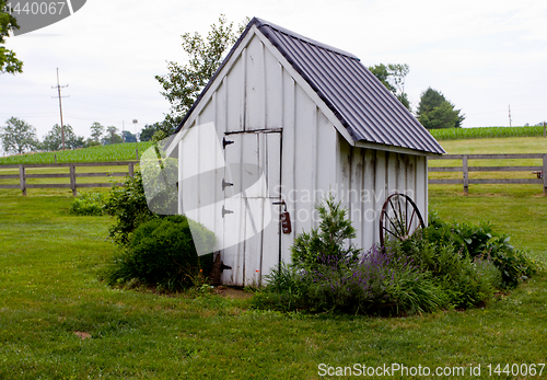 Image of Old white house on farmland