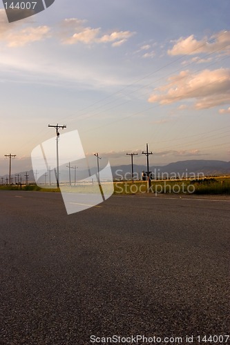 Image of Road and the Field with the Electric Poles