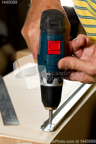 Image of Woodwork tools working on piece of plywood