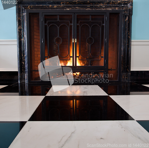 Image of Old fireplace with logs