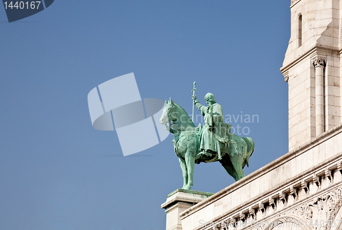 Image of Bronze statue of horseman guards Sacre Coeur