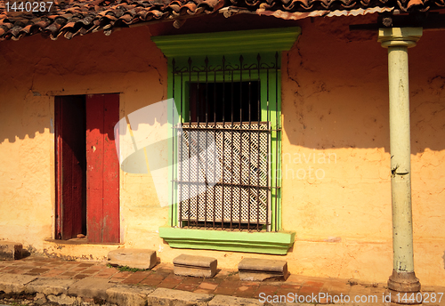 Image of Old door and window in colorful wall