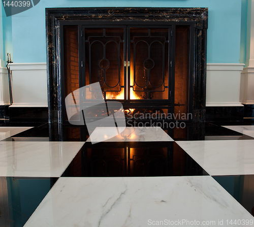 Image of Old fireplace with logs