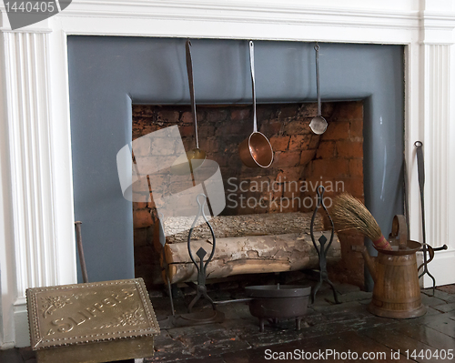 Image of Old fireplace with logs