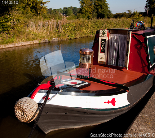 Image of Ornate brass driving lamp on bow of canal barge