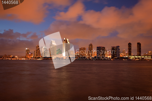 Image of Orange clouds reflect light from San Diego Skyline