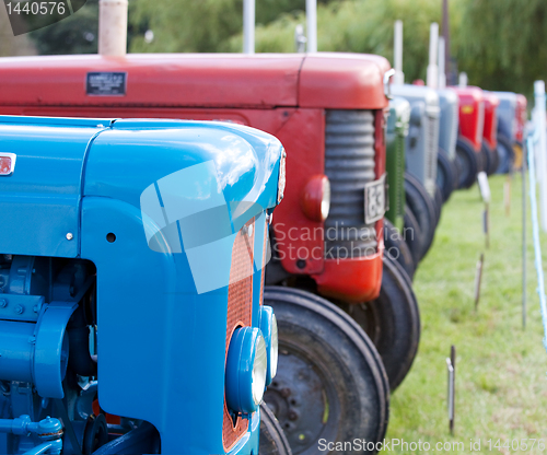 Image of Row of old tractors