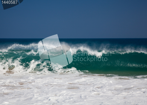 Image of Waves over beach on Lumahai