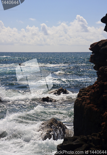 Image of Rocky headland and raging ocean