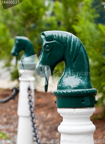 Image of Green horse head hitch post