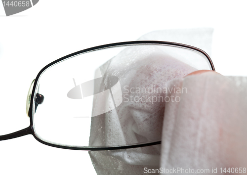 Image of Cleaning glasses with cloth