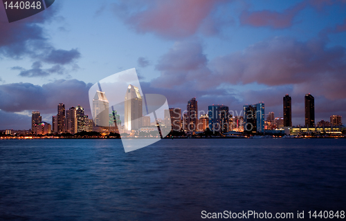 Image of Orange clouds reflect light from San Diego Skyline